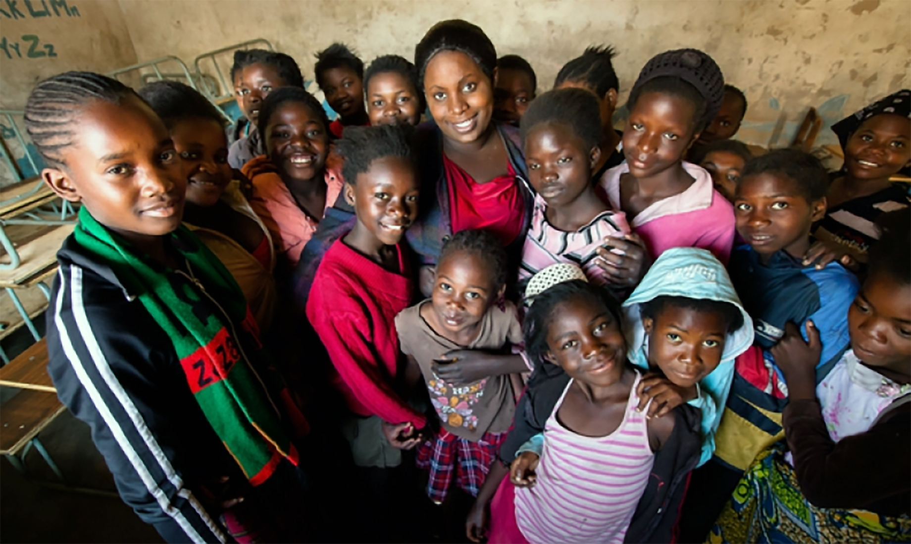 a group of adolescent girls and women