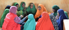 adolescent girls sitting in a circle