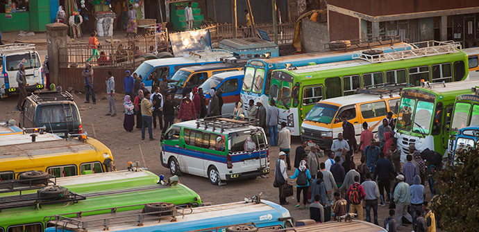 many buses on a busy street in Ethiopia