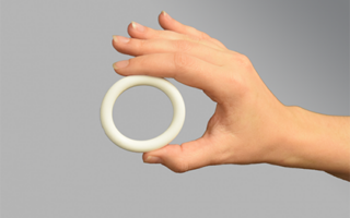 Nestorone-Only Vaginal Ring – Population Council a hand holding up the Nestorone-only vaginal ring